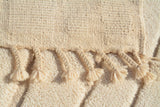 Lighter Rug | Handcrafted High Low White Design | Illuminate Collective