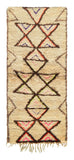 Overhead view of a beautifully plush, unique handmade 1970s vintage Azilal Moroccan wool and cotton runner rug named The Queen (2'10" x 6'8") featuring a cream base with large brown geometric triangles and diamonds, accented by elegantly thin inner lines of neon pink, purple, orange, and green, with a 3/4-inch pile.