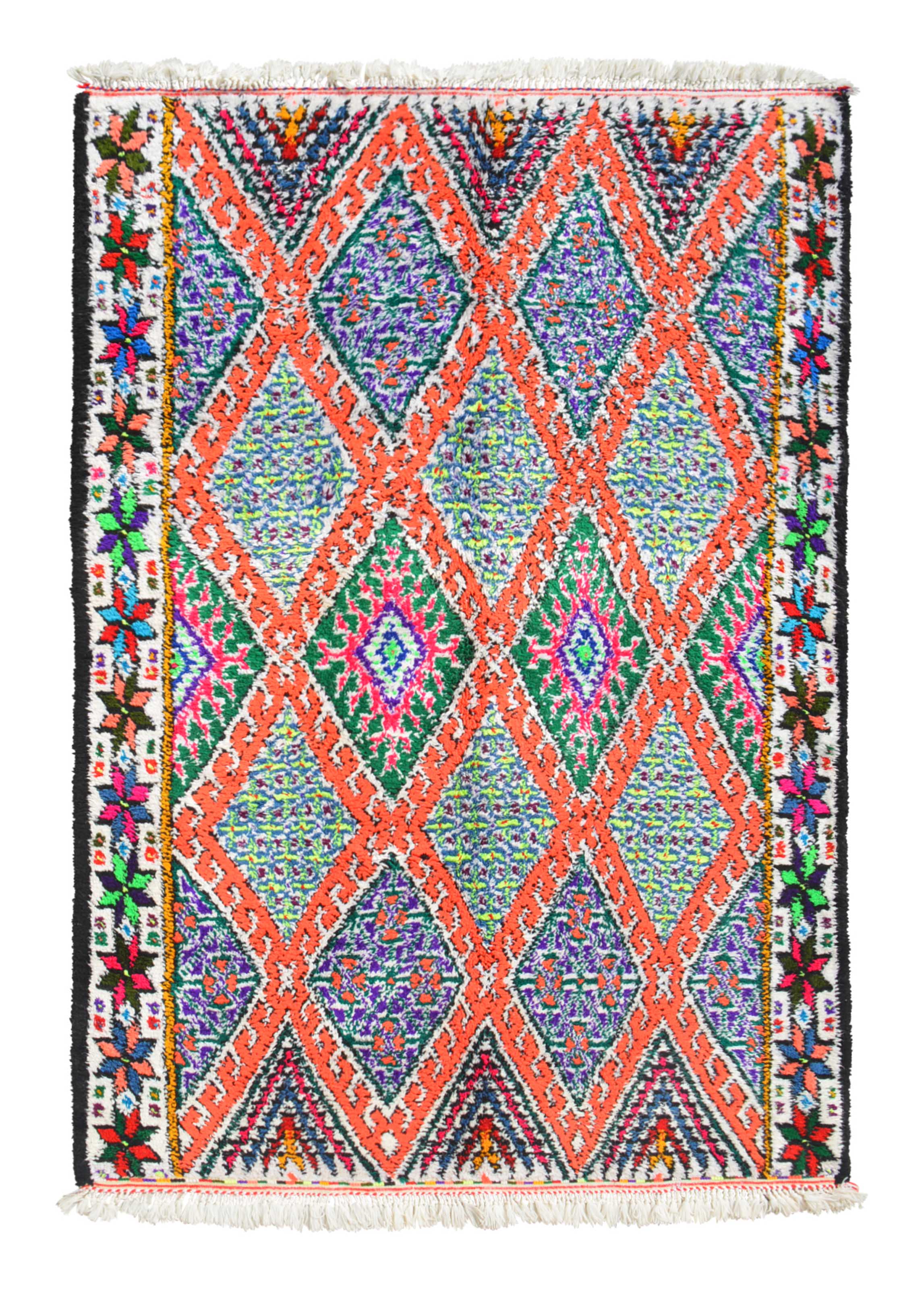 Overhead view of a highly vibrant, heavily detailed handmade 1960s vintage Azilal Moroccan cotton area rug named Truly Living (5'8" x 8'2") featuring a dense pattern of interlocking geometric diamonds outlined in neon orange with speckled blue and purple centers, framed by a colorful floral star border, with a 3/4-inch pile.