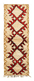Overhead view of a deeply plush, high-contrast handmade 1970s vintage Azilal Moroccan wool and cotton runner rug named Gone Mad (2'6" x 7'1") featuring a soft cream base covered in a large, jagged, spiky geometric diamond lattice woven in bright red and black, with a 3/4-inch pile.