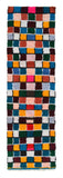 Overhead view of an extra-long, highly vibrant handmade 1970s vintage Boucherouite Moroccan cotton runner rug named Powerful (2'10" x 10'2") featuring an edge-to-edge geometric checkerboard grid woven in solid blocks of teal, green, mustard yellow, hot pink, burgundy, white, and blush, with a 3/4-inch pile.