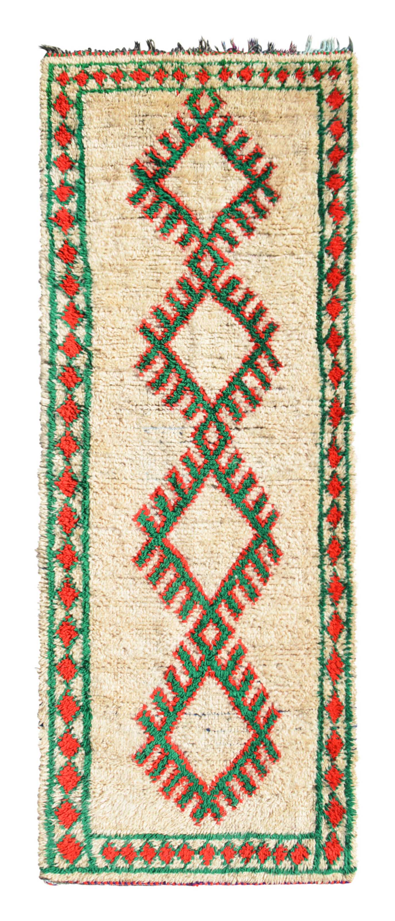 Overhead view of a deeply plush, highly striking handmade 1960s vintage Azilal Moroccan wool and cotton runner rug named Watch Out (3'4" x 9'5") featuring a cream base framed by a red and green diamond border, with three large, connected central diamonds displaying toothed, comb-like edges woven in bright red and vivid green yarn, with a 3/4-inch pile.