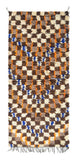 Overhead view of a deeply plush, highly textured handmade 1970s vintage Azilal Moroccan wool and cotton accent rug named The Groove (2'10" x 6'4") featuring an edge-to-edge earthy checkerboard pattern in brown, taupe, and cream, overlaid with squiggly vertical lines of bright orange and cobalt blue yarn, with a 3/4-inch pile.