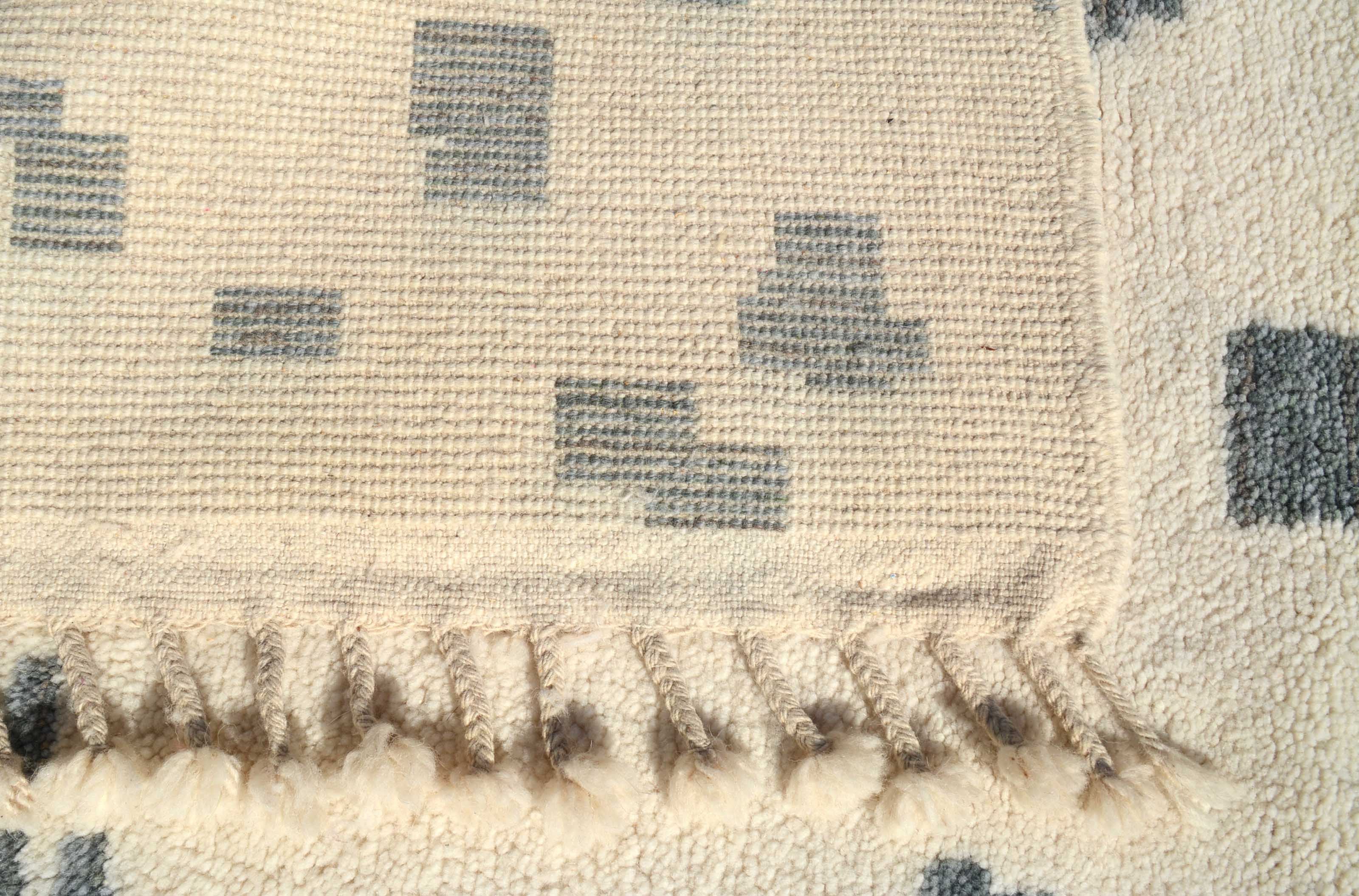 Illusions - Handmade Blue Dot Moroccan Rug for Modern Spaces