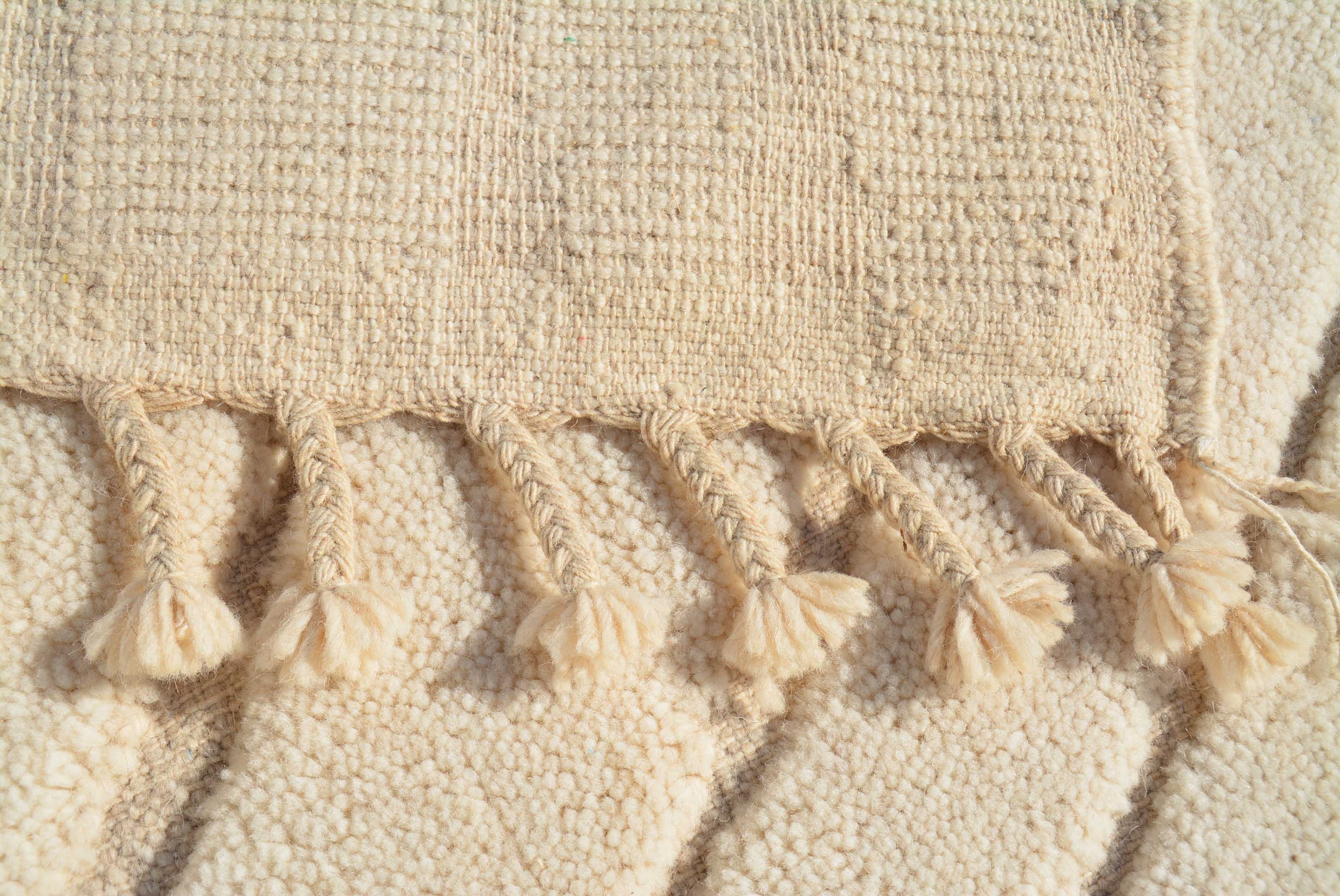 Lighter Rug | Handcrafted High Low White Design | Illuminate Collective