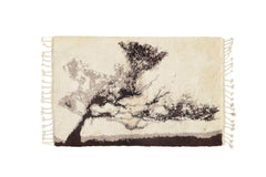 white and black moroccan rug