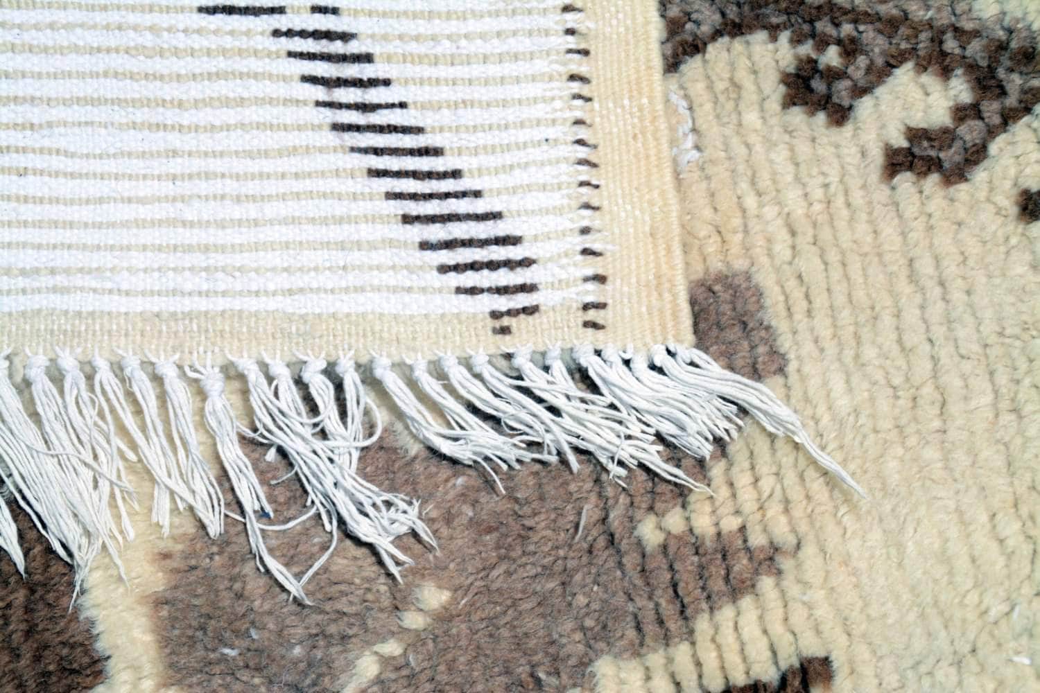 white and brown rugs