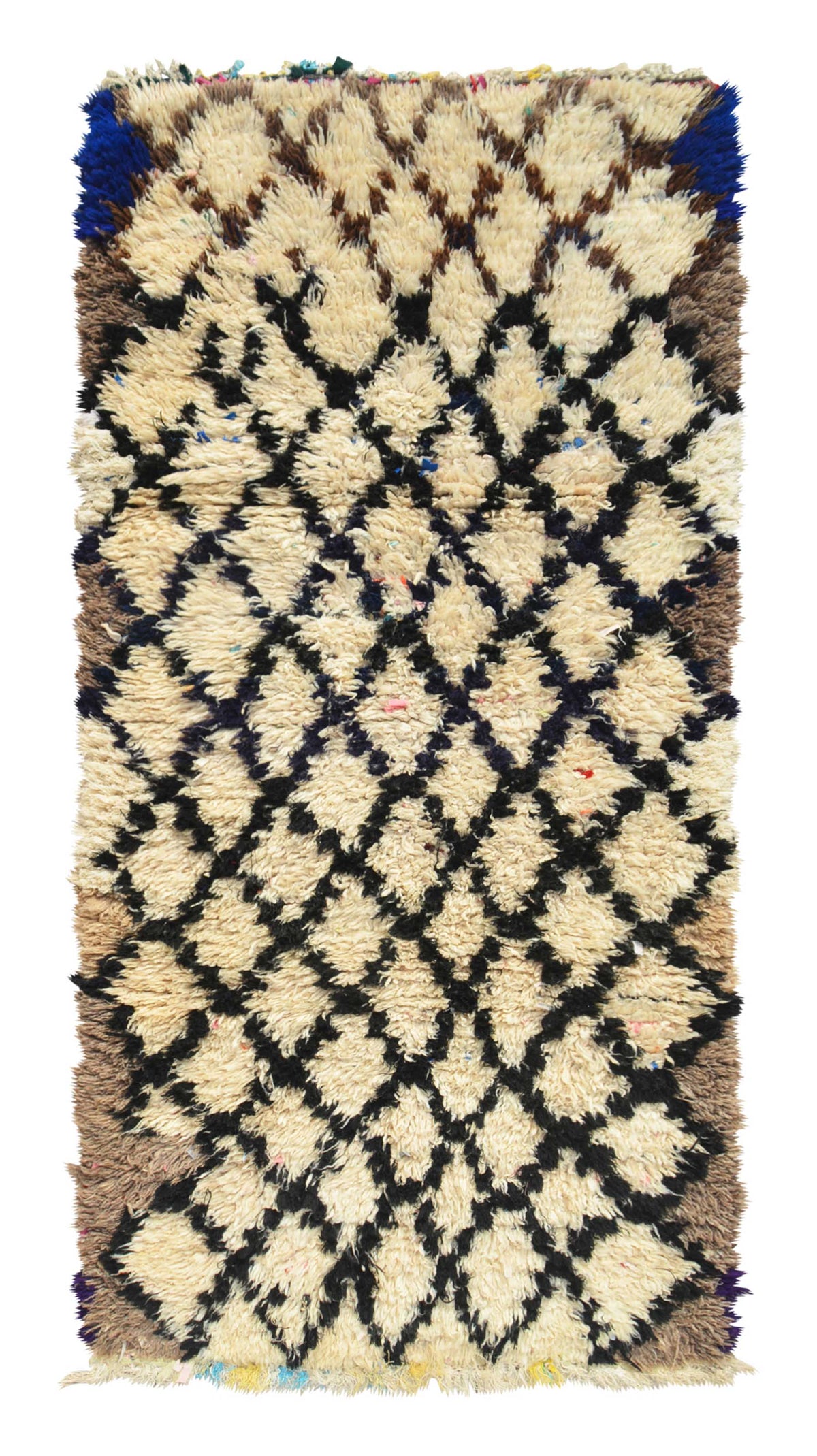 Overhead view of a deeply plush, high-contrast handmade 1960s vintage Moroccan wool and cotton runner rug named High Stakes (3'4" x 7') featuring a thick cream base covered in a heavy black wobbly geometric diamond lattice, framed by earthy brown side borders and vivid royal blue top corners, with a 3/4-inch pile.