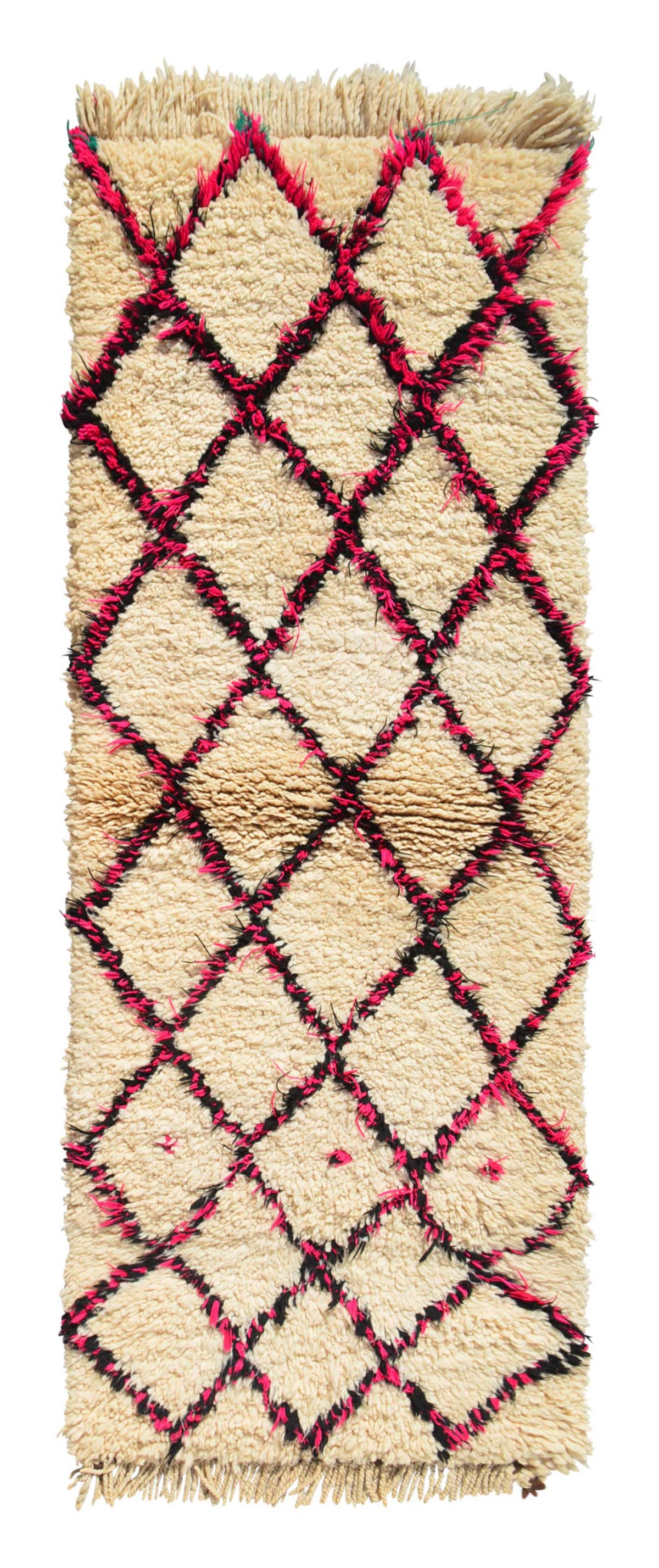 Overhead view of a very soft, deeply plush handmade 1970s vintage Beni Ourain Moroccan wool and cotton runner rug named Effortless (2'7" x 7') featuring a thick cream base covered with a classic black geometric diamond lattice intertwined with bright neon pink yarn, with a 1-inch pile.