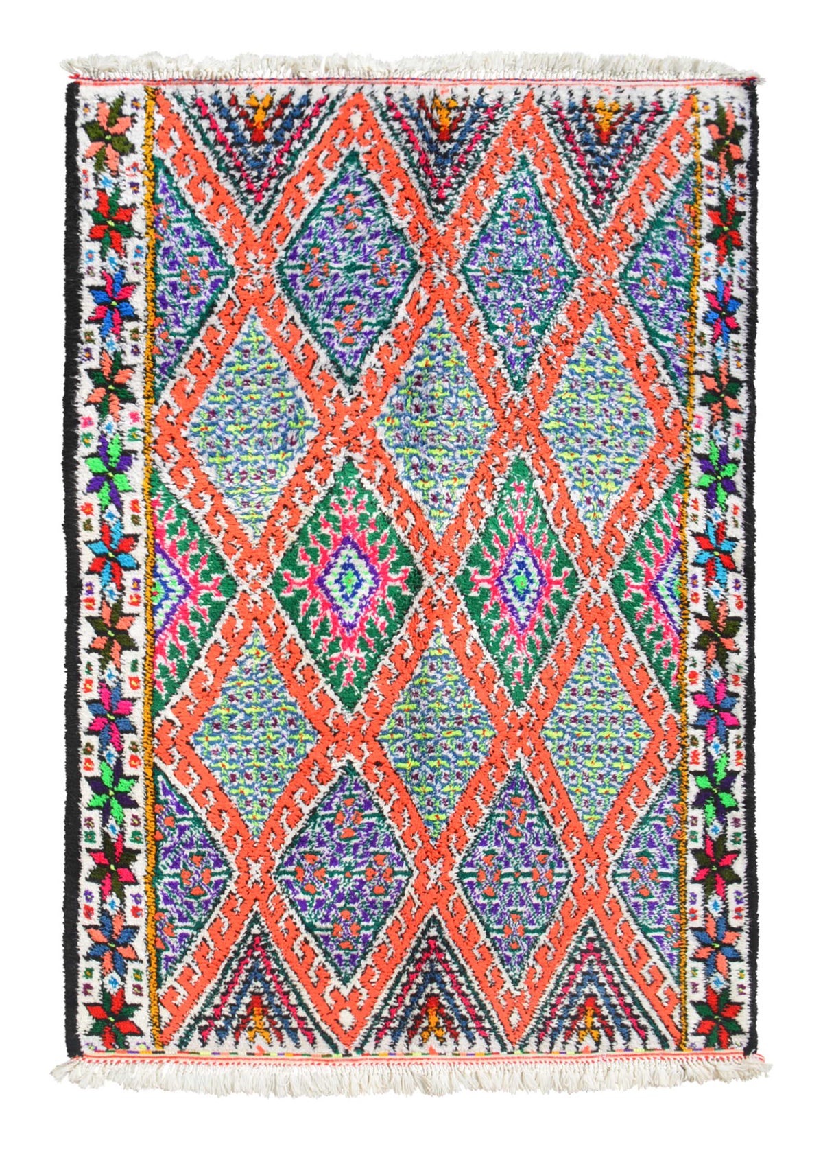 Overhead view of a highly vibrant, heavily detailed handmade 1960s vintage Azilal Moroccan cotton area rug named Truly Living (5'8" x 8'2") featuring a dense pattern of interlocking geometric diamonds outlined in neon orange with speckled blue and purple centers, framed by a colorful floral star border, with a 3/4-inch pile.