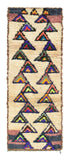 Overhead view of a deeply plush, vibrant handmade 1970s vintage Azilal Moroccan wool and cotton runner rug named Time Stands Still (3' x 8'3") featuring a cream base with two vertical columns of stacked dark triangles filled with nested multi-colored motifs in purple, green, orange, and yellow, bordered by horizontal stripes at the ends, with a 3/4-inch pile.
