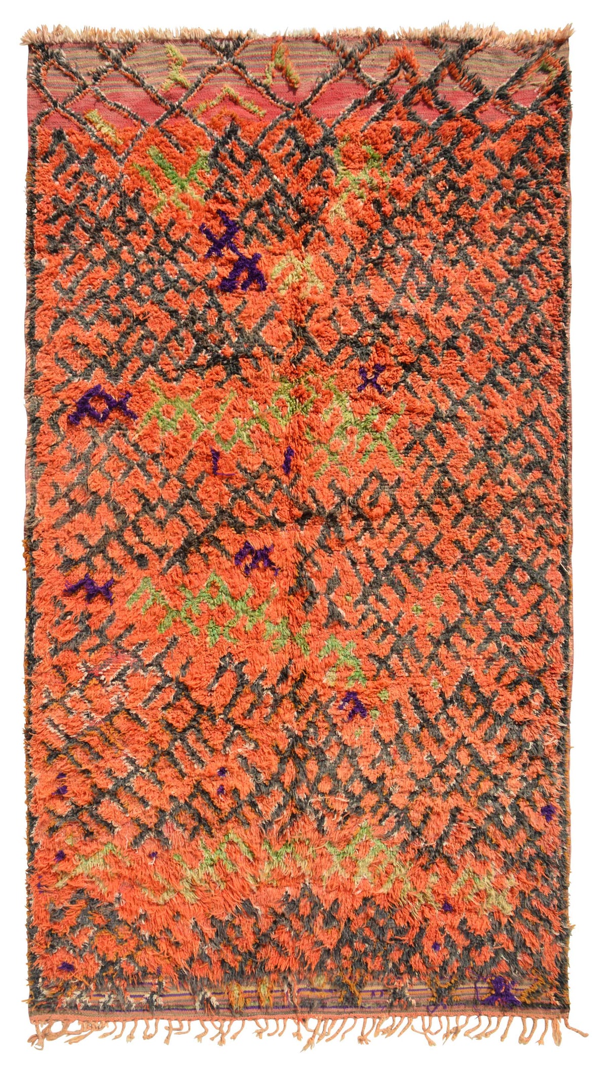 Overhead view of a massive, room-sized handmade 1960s vintage Boujad Moroccan wool area rug named Wild Ride (6'2" x 12') featuring an intense bright orange base covered in a chaotic, frantic dark charcoal geometric lattice, accented with free-floating neon green and purple tribal motifs, with a 3/4-inch pile.