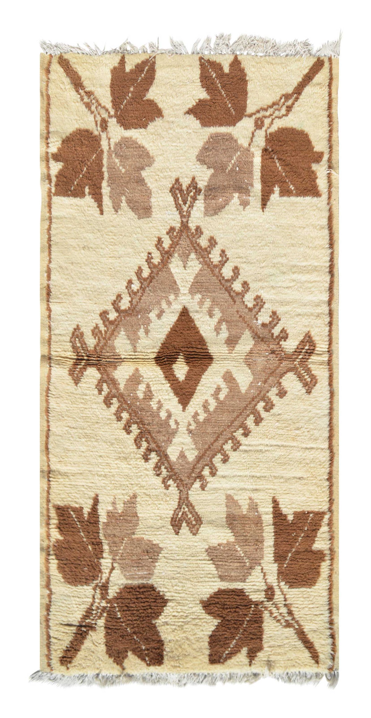 Overhead view of a very rare, plush handmade 1970s vintage Beni Ourain Moroccan wool rug named Regal Dreams (3' x 6'2") featuring a cream base with a central stepped diamond and four large corner leaf motifs woven in two-tone earthy brown yarn, with a 3/4-inch pile.