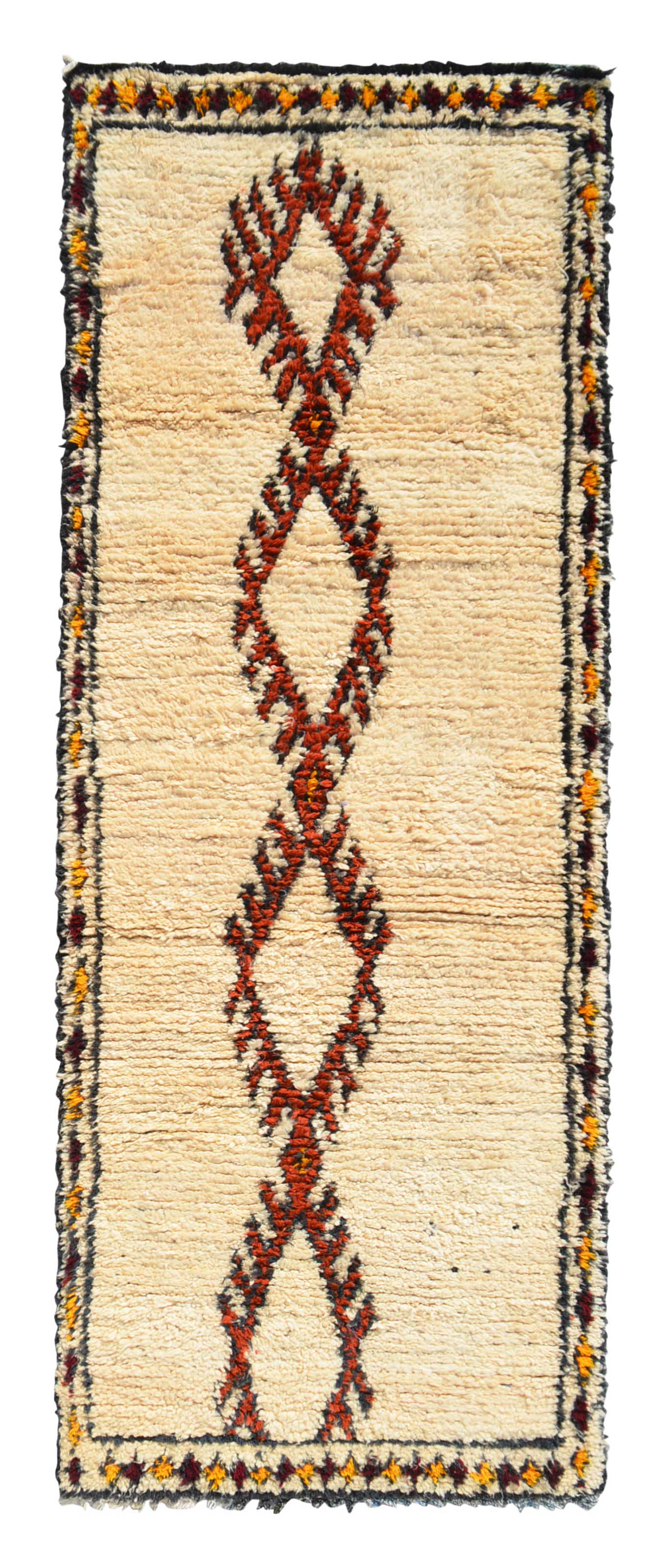 Overhead view of a wonderfully soft, plush handmade 1960s vintage Beni Ourain Moroccan wool and cotton runner rug named Home Grown (3'3" x 8'8") featuring a cream base with a vertical chain of serrated fox brown geometric diamonds, framed by a dark border with yellow and red accents, with a 3/4-inch pile.