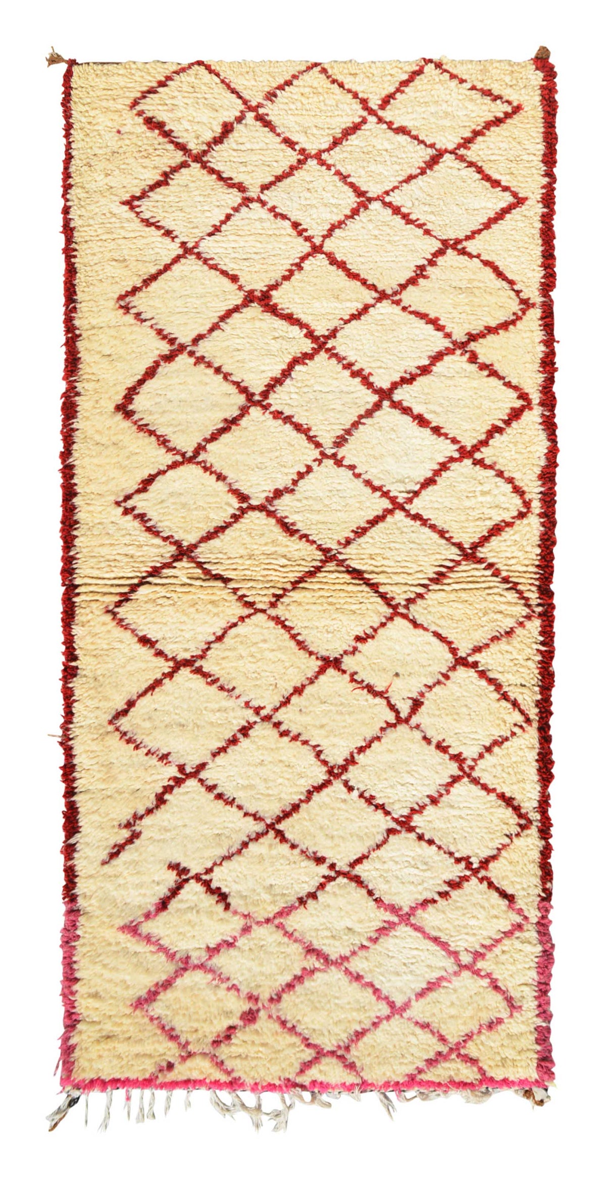 Overhead view of a very soft, deeply plush handmade 1970s vintage Beni Ourain Moroccan wool and cotton runner rug named Love You (3'4" x 7'10") featuring a thick cream base with a minimalist geometric diamond lattice that transitions beautifully from deep red to bright pink, with a 1-inch pile.