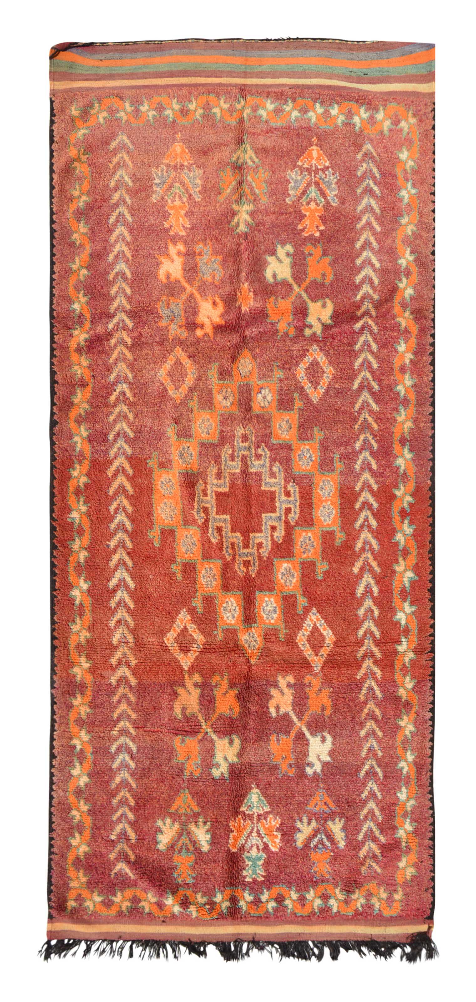 Overhead view of a massive, room-sized handmade 1960s vintage Moroccan wool area rug named Sunny State Of Mind (5'4" x 11'6") featuring an intense terracotta red base dominated by a large stepped central medallion in orange and pale blue, bordered by repeating chevron arrows and abstract tribal symbols, with a 3/4-inch pile.