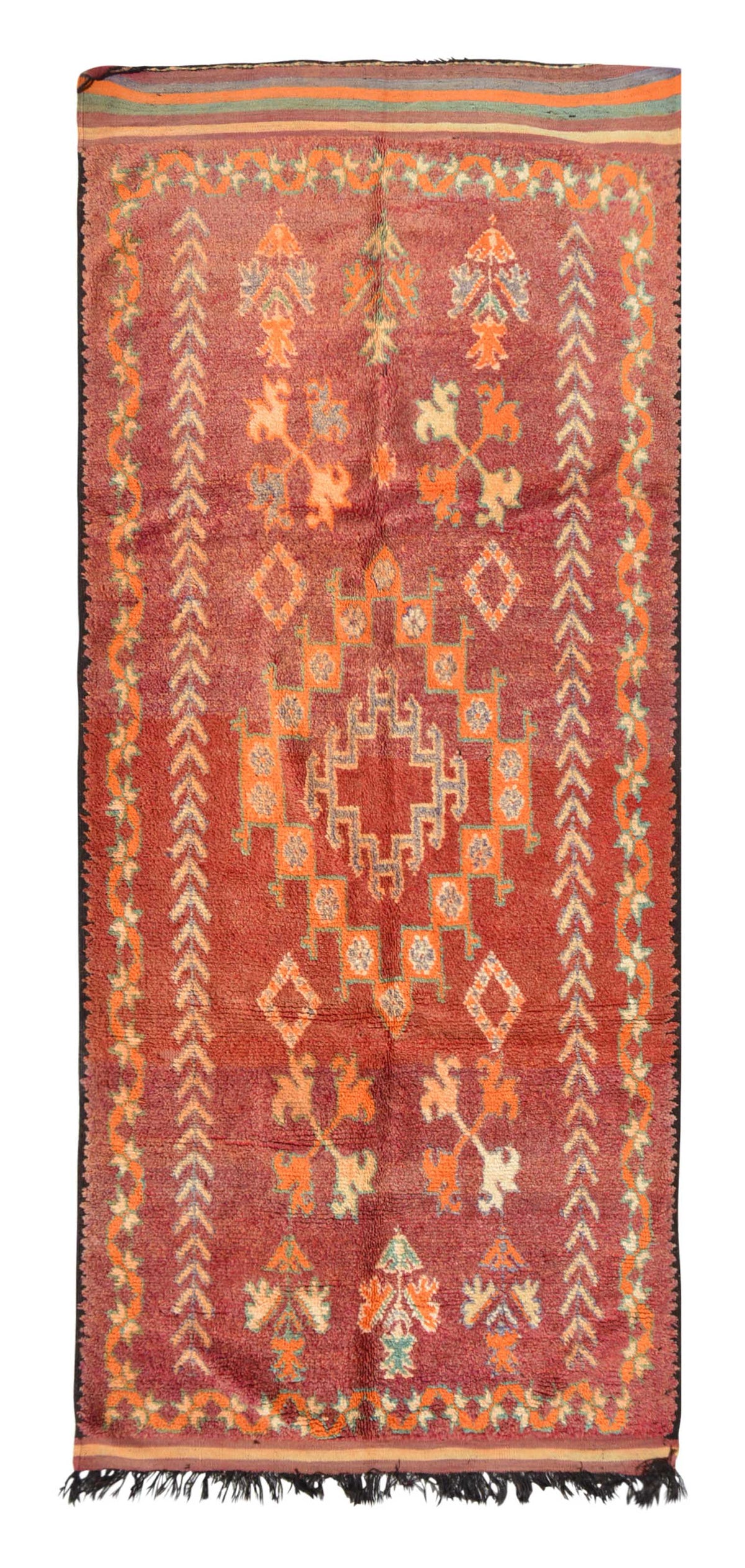 Overhead view of a massive, room-sized handmade 1960s vintage Moroccan wool area rug named Sunny State Of Mind (5'4" x 11'6") featuring an intense terracotta red base dominated by a large stepped central medallion in orange and pale blue, bordered by repeating chevron arrows and abstract tribal symbols, with a 3/4-inch pile.