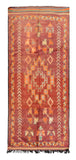 Overhead view of a massive, room-sized handmade 1960s vintage Moroccan wool area rug named Sunny State Of Mind (5'4" x 11'6") featuring an intense terracotta red base dominated by a large stepped central medallion in orange and pale blue, bordered by repeating chevron arrows and abstract tribal symbols, with a 3/4-inch pile.